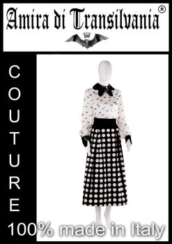 Abito couture stile collegiale con fantasia farfalle e pois